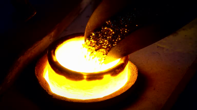 Smelting scrap gold in blacksmith workshop